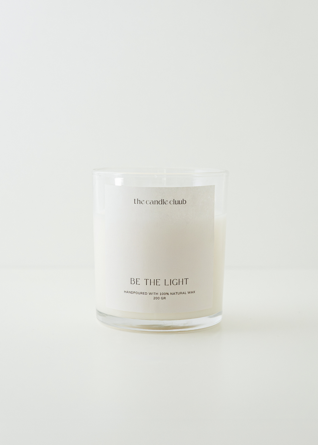 Classic Cluub Candle in the scent Fresh Woods made from soy and coconut wax featured in glass jar with bamboo lid