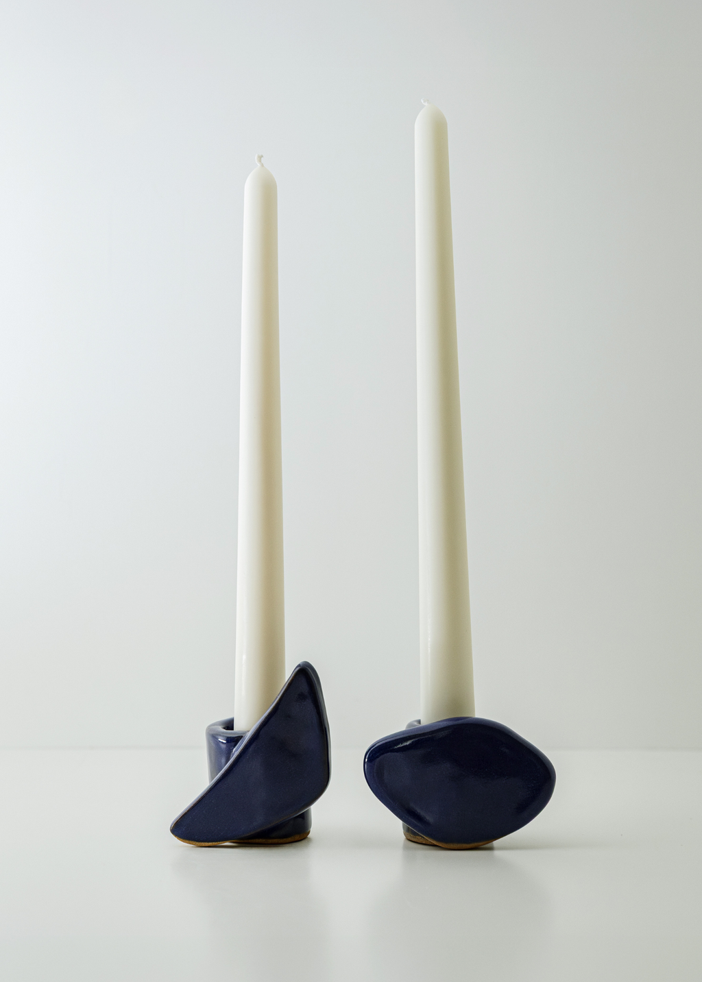 
From Light to Table blue ceramic candle holder set with textured irregular surface and taper candle holders
