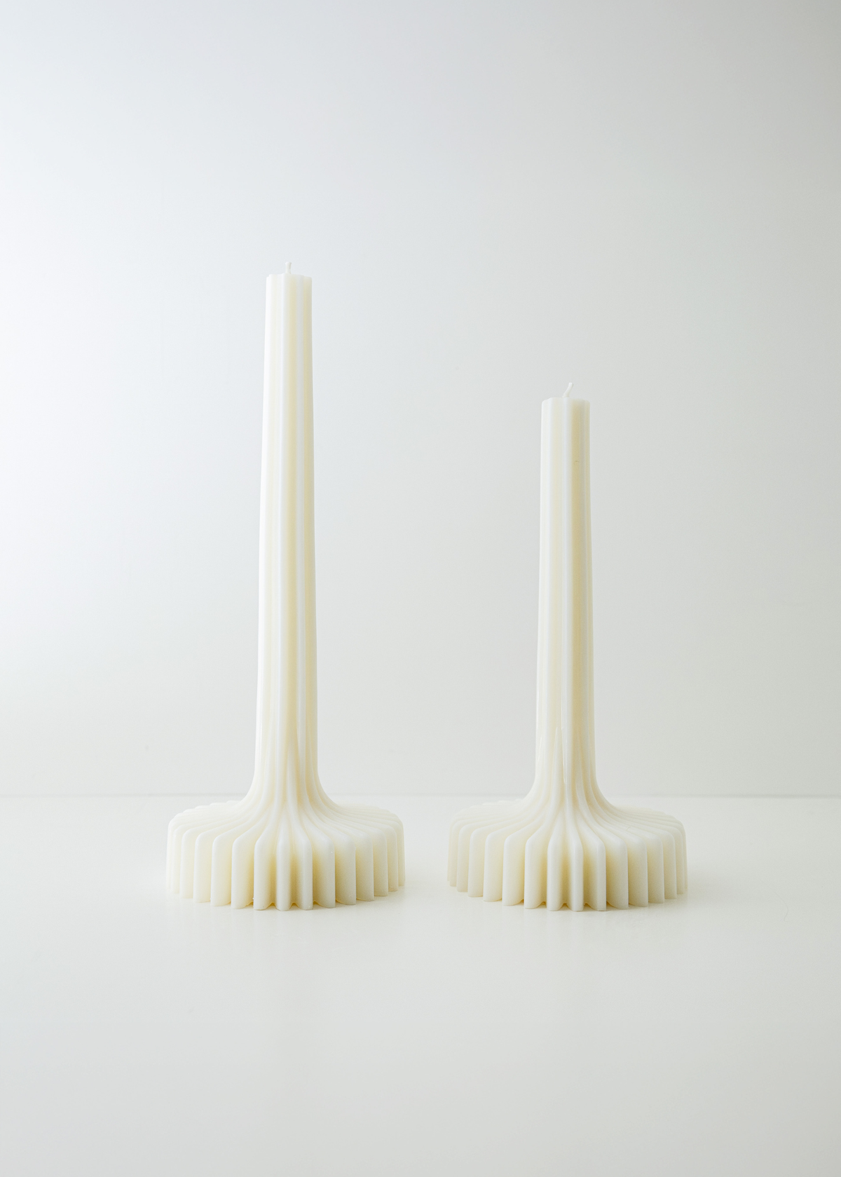 Incontro candles white soy and coconut wax candle with a ribbed design on a light background