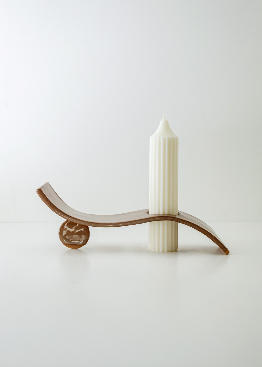 Objects of Light white pleated pillar candle set with terracotta ceramic candle holder on a white background